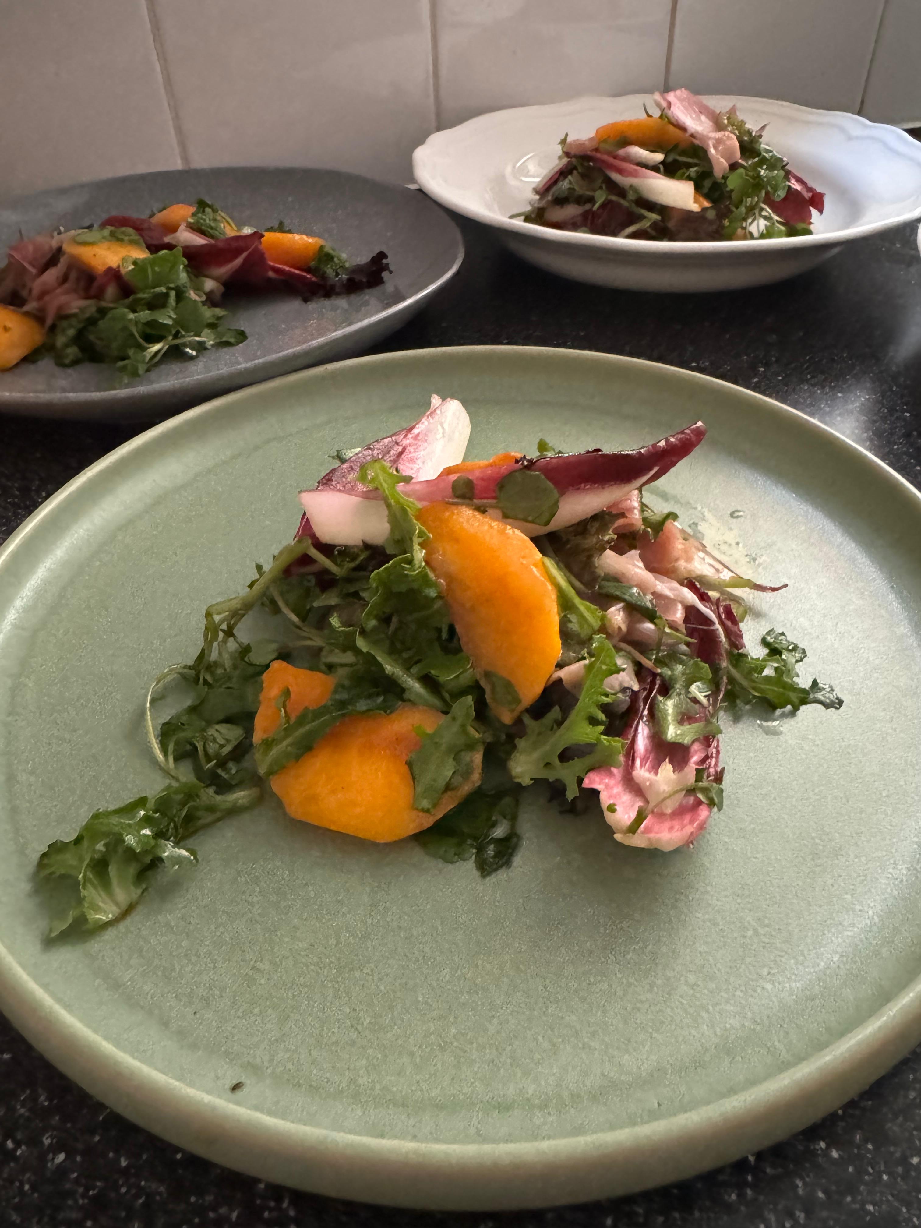 Charred peach and speck salad